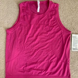 Lululemon Swiftly Breathe Muscle Tank Top
Sonic Pink / Sonic Pink. NWT. Size 10.